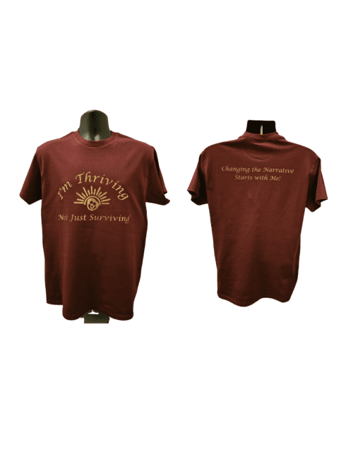 A maroon t-shirt with the words " the thirtieth " on it.